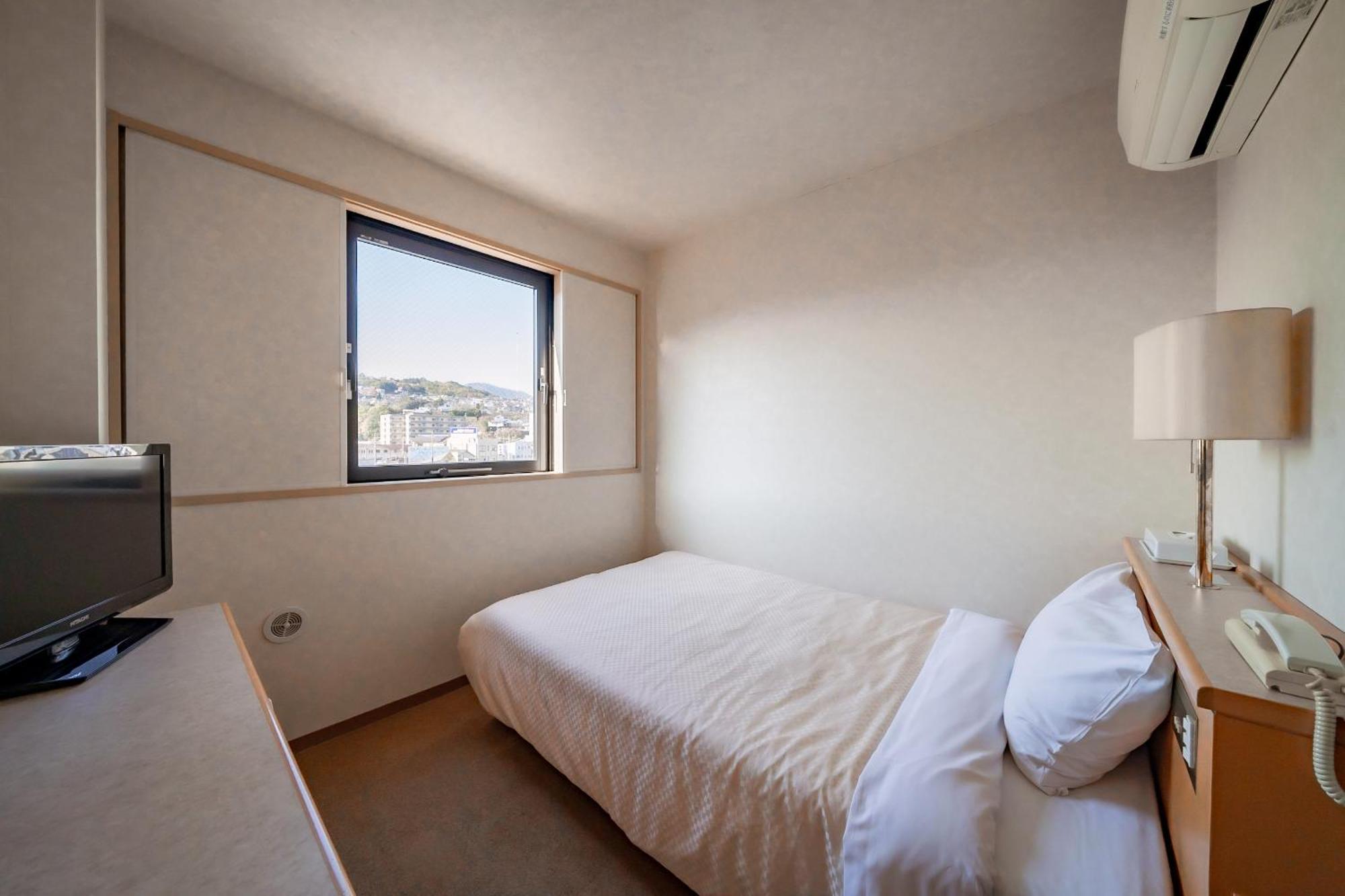 Business Hotel Kg Oita Bagian luar foto