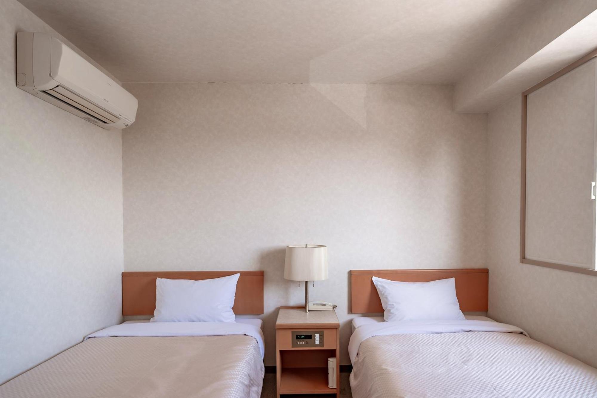 Business Hotel Kg Oita Bagian luar foto