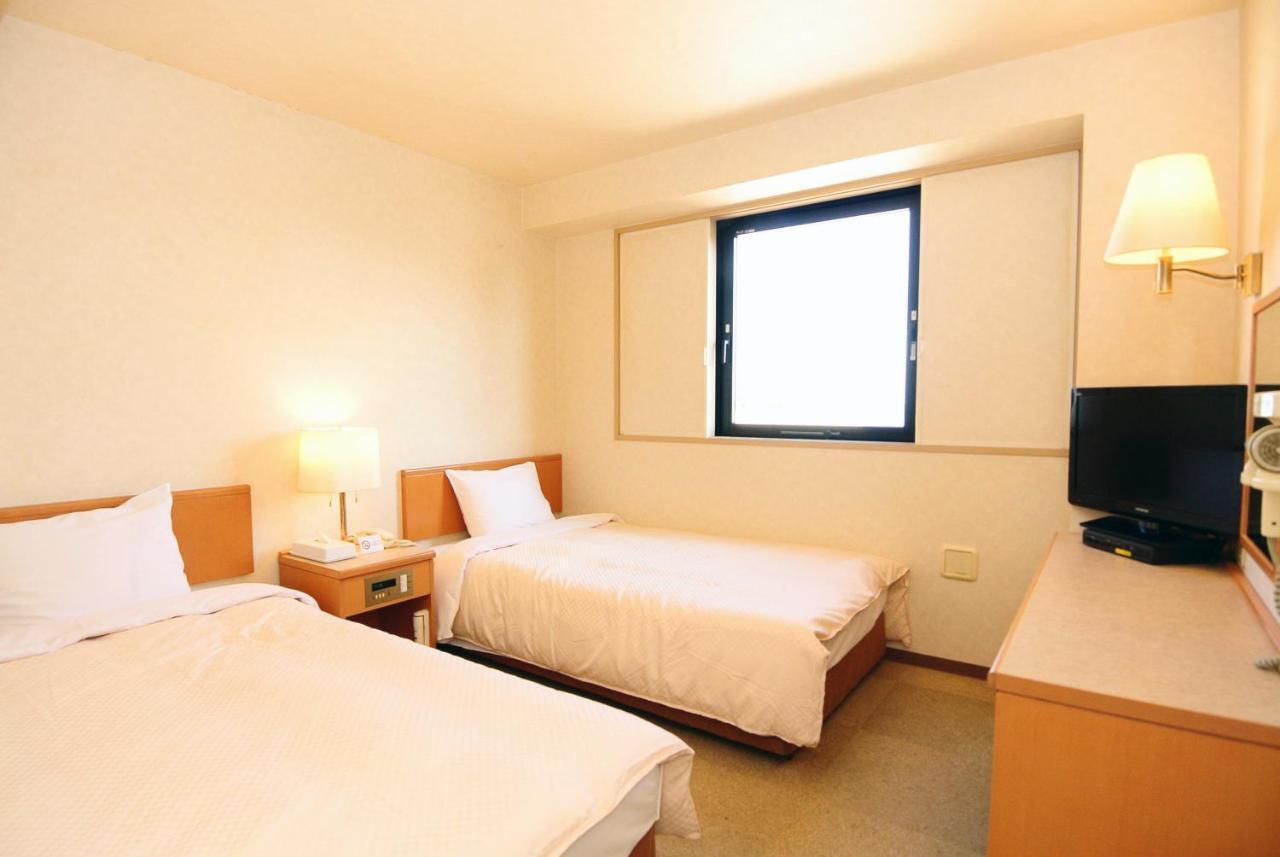 Business Hotel Kg Oita Bagian luar foto