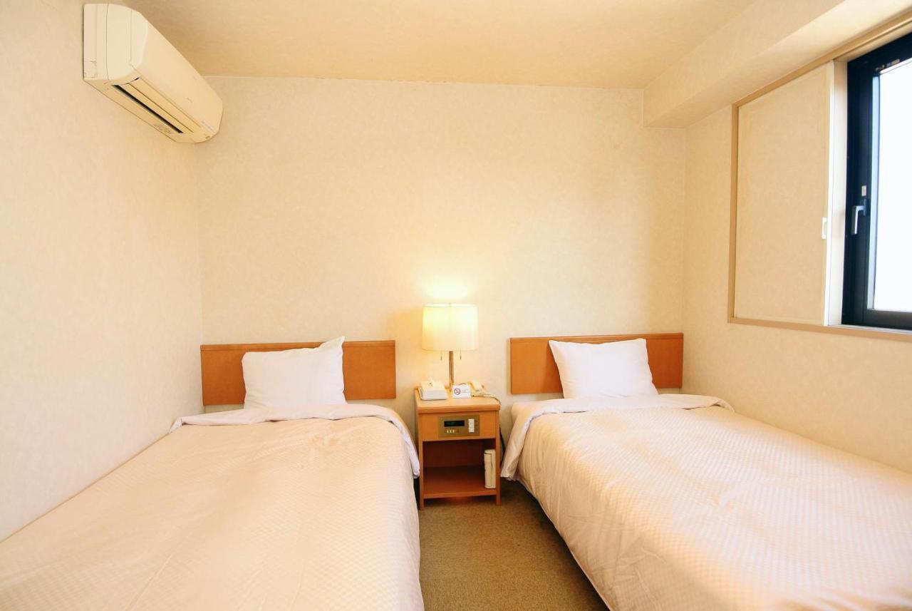 Business Hotel Kg Oita Bagian luar foto
