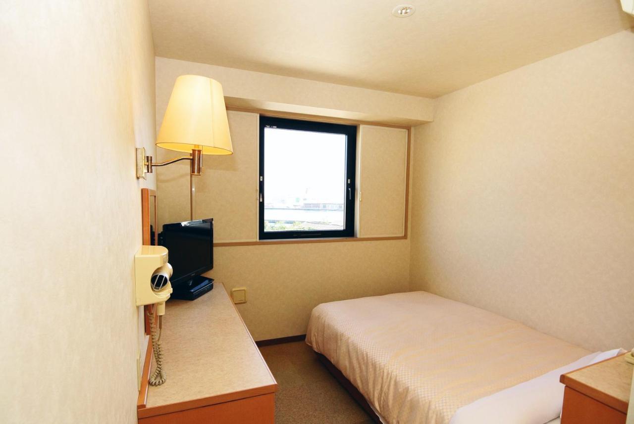 Business Hotel Kg Oita Bagian luar foto
